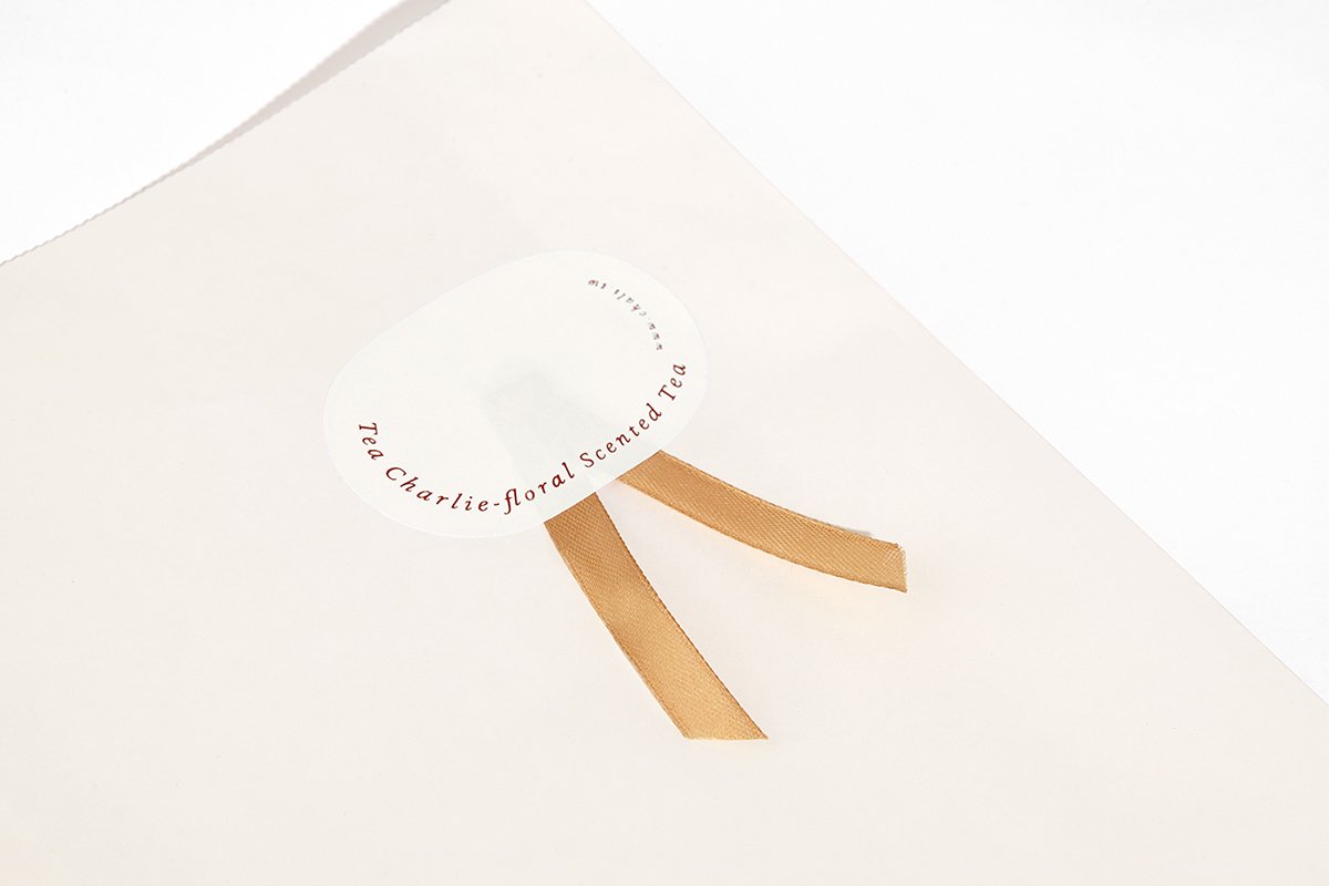 深圳VI設計 深圳VI策劃 茶查理花茶VI形象設計 標簽設計